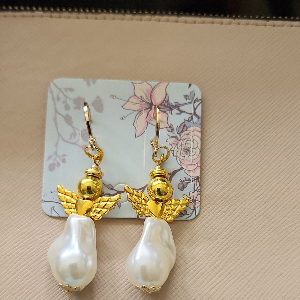 Gold and White Angel Wing Earrings Handcreated For Itiah Angel For Learning.